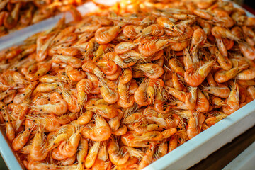 Dried shrimp is sold in the  market and is a popular ingredient in cooking.