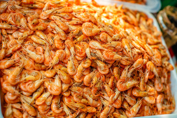 Dried shrimp is sold in the  market and is a popular ingredient in cooking.