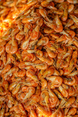 Dried shrimp is sold in the  market and is a popular ingredient in cooking.
