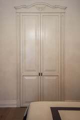 interior of a room with wooden door