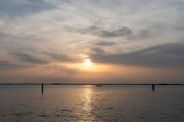 Naklejka na ściany i meble Sunset in the Venice Lagoon. magic