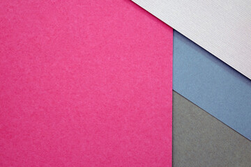 Thick paper of different colors top view. background with geometric shapes. Abstract background...