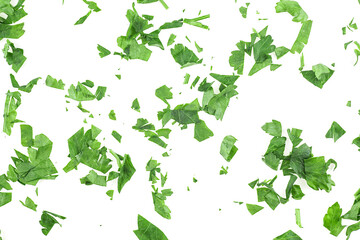 Fresh chopped green parsley leaves isolated on a white background, top view. Fresh herbs.