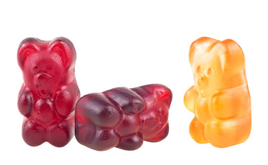 Jelly gummy bears isolated on a white background. Three colored sweet jelly marmalade bears.