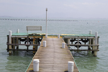 Pier on sambaqui beach in Florianópolis, Brazil