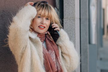 woman talking on mobile phone in the street