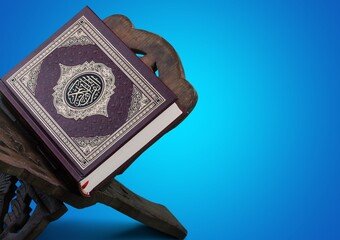 The holy book of the Koran on the wooden stand