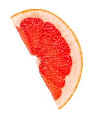 Slice of grapefruit close-up isolated on white background.