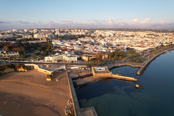 Obraz premium Aerial from the city Lagos in the Algarve Portugal at sunrise marina harbor