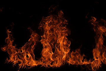 Fire flame burning and fire glowing on black background.