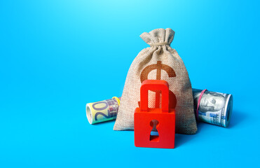 Dollar money bag and red padlock. Sanctions and Restrictions. Freezing of assets, seizure of...