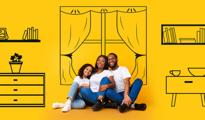 Happy black family planning and imagining new home interior