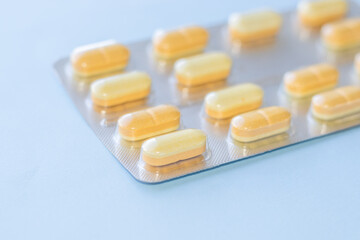 heap of medical pills different shapes plastic blisters isolated.tablets in packs stack of recycle trash garbage,sorting.healthcare and medicine.natural herbs, organic, vitamins, antidepressants,pain