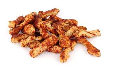 Group of crunchy knobbly twig shaped wheat savoury snacks with a yeast flavour coating