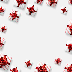 White gift boxes with red bows.