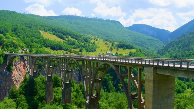 Durdevica Tara Bridge, also known as the bridge of anti fascist, hero lieutenant Bozhidar Zugic, is a concrete arch bridge over the Tara Canyon River in northern Montenegro.