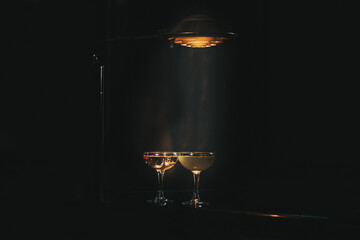 dramatic dark cocktails with lamp