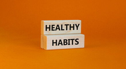 Time to healthy habits symbol. Concept words Healthy habits on wooden blocks on a beautiful yellow background. Business, medical and healthy habits concept. Copy space.