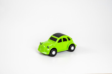 Toy plastic car isolated on white background.
