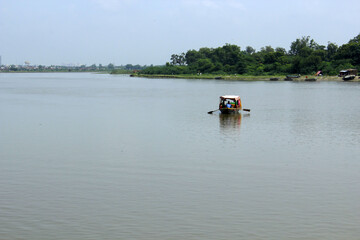 Fototapeta na wymiar Boat on the river Jamna (Yamuna). Mathura, India 