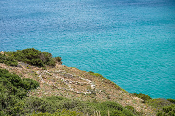 sea and rocks peace sign