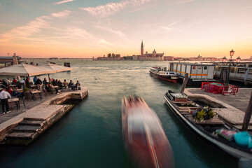 View of Venezia lagoon with the pier and San Giorgio Maggiore church, Veneto, Italy.