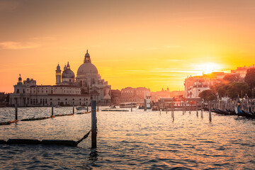Obraz na płótnie Canvas Sunset at Venezia with the Gran Canale (Grand Canal) and the 'Basilica di Santa Maria della Salute', Veneto, Italy.