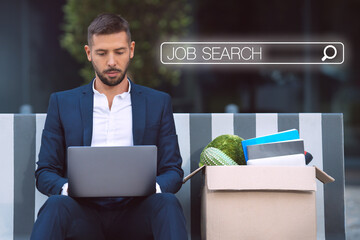Unemployed office worker searching for a job. Man looking for new vacancies in internet. Man...