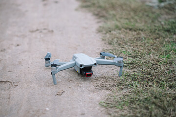 Drone on the ground in the field, modern technology