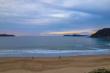 One hundred percent cloud covered sunrise over the sea