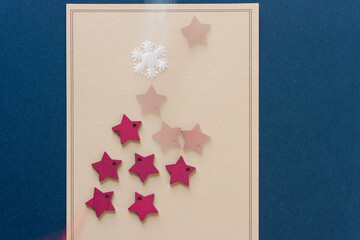 old paper with moving stars and snowflakes (intentional blur effect)