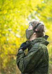 Military men with automatic weapons getting ready to play airsoft