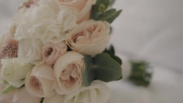 wedding bouquet close-up camera moves forward