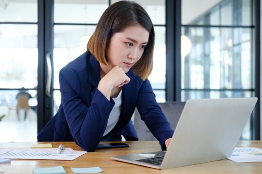 Young entrepreneur businesswoman working in modern office - Powered by Adobe