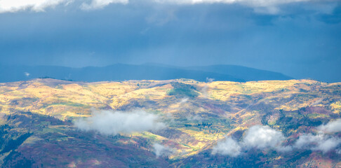 Autumn Color, Light, Shadow, and Dramatic Skies Over the Mountains Above Durango Colorado