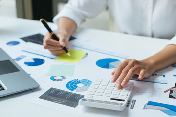 business man working about business investment report on desk office