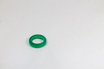 green jade ring on an isolated white background.