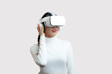 Metaverse Concepts, Asian woman in vr glasses and white dress with virtual reality headset