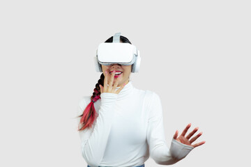 Metaverse Concepts, Happy Asian woman in vr glasses, playing video games with virtual reality headset, trying to touch something with hands