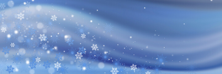 Fototapeta na wymiar Beautiful white snowflakes and bokeh on a blue background. Panoramic Christmas background with copy-space.