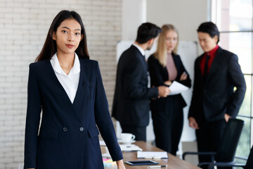 Optimistic multiethnic colleagues in boardroom