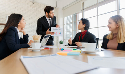 Group of diverse colleagues brainstorming in boardroom