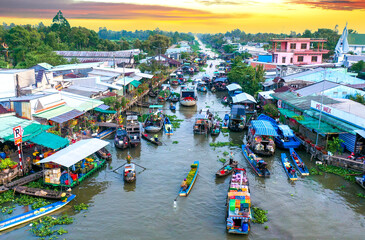 Busy scene of sellers and buyers at Nga Nam floating market in the days leading up to the Lunar New Year