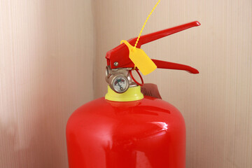 Naklejka premium A fire extinguisher is a small or portable extinguisher commonly used in offices, homes, and vehicles. This tool is useful for extinguishing fires