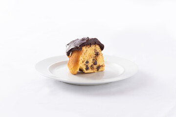 Yellow Chocolate Chip Pound Cake on Plate, white background, center