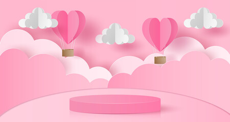 Paper cut of Valentine's Day background with pink cylinder podium, heart hot air balloons and clouds for products display presentation, poster, greeting card