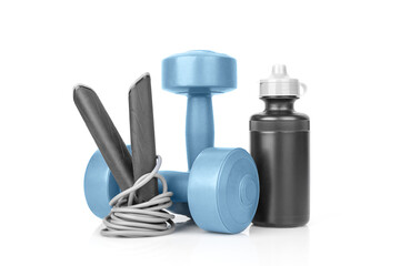 Set of fitness equipment. Sport bottle, dumbbells, jump rope on a white background isolated, front view, close-up. Fitness and activity. Healthy lifestyle. Home workout.