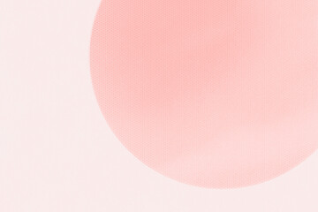 Pink abstract Japanese paper background with circles arranged on it.