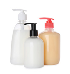 Dispensers of liquid soap on white background