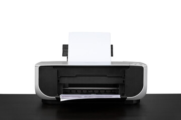 Laser home printer on table against white backgorund